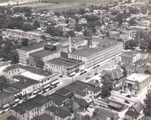 City street with unidentified factory, 1950 (Hanover, Ontario)