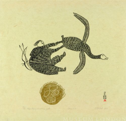 MAN TRYING TO CATCH A GOOSE