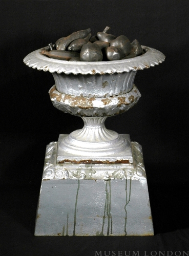 URN WITH FRUIT