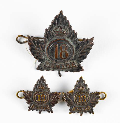WWI 18th Battalian Cap and Shoulder Badges