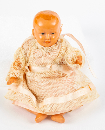 Plastic Doll with Netted Dress
