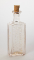 Cairncross & Lawrence Glass Medicine Bottle